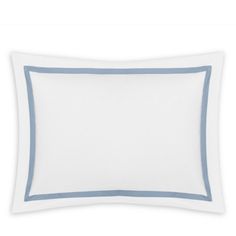 a white and blue pillow on a white wall with a light blue border around it