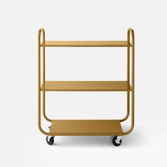 a small cart with two shelves and wheels on the front, one is gold in color