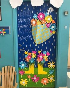 a door decorated with flowers and umbrellas for the springtime break - up party