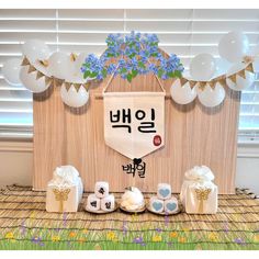 a table topped with lots of white and blue decorations