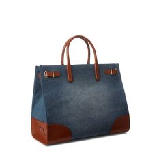 Rendered in vintage-inspired washed denim the large Devyn tote bag is designed with a spacious silhouette and a myriad of pockets offering ample storage for your essentials. It’s trimmed with supple full-grain leather—which is distinguished by its naturally smooth finish—for a luxurious touch. Denim Blue Double Handle Shoulder Bag For Travel, Denim Blue Double Handle Travel Shoulder Bag, Denim Double Handle Shoulder Bag For Travel, Denim Double Handle Travel Shoulder Bag, Denim Blue Tote Shoulder Bag For Travel, Denim Travel Satchel Bag, Travel Denim Satchel Bag, Rectangular Medium Wash Shoulder Bag For Travel, Travel Shoulder Bag In Medium Wash Rectangular Shape