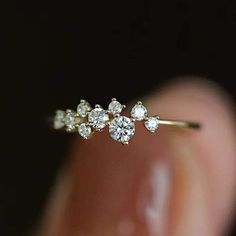 All Silver items will be shipped via standard shipping and will be delivered in 2 to 3 weeks after the shipment. All gold items will be shipped via express shipping and will be delivered in 5 to 10 days after the shipment. 14k Moissanite Cluster Ring, Minimalist Cluster Ring, Dainty Diamond Wedding Ring, Stackable Ring, Gold Ring for Women,  Silver Cluster Ring ❖ Details ◽ Made to Order ◽ Gold Karat : 10k , 14k, 18, and 925 sterling silver ◽ Available in Rose Gold, Yellow Gold, White Gold ◽ Gemstone : Moissanite ◽ Color : Colorless ◽ Clarity : VVS ◽ Stone Shape : Round ◽ Stone Size : 1.3 mm to 2.5mm   ❖ Processing   All items in our shop are made to order, handmade, no stock with utmost care. Please allow up to 3-4 weeks for your piece to be crafted.  ❖ Rush order    You can upgrade the pr Ring For Women Silver, Gold Ring For Women, Gold Items, Face Piercings, Silver Items, Diamond Wedding Ring, Ring Minimalist, White Jewelry, Ring Dainty