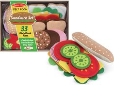 an assortment of felt food in a box