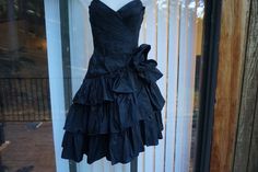 "Vintage black dress by Tadashi. Labeled size 4 - please see measurements to ensure fit.  In good vintage condition!  Measurements taken across front laid flat 15.5\" across front armpit to armpit 12.5\" across front of waist 18.5\" across front at hips 28\" length from armpit to hem on shorter side" Black Strapless Dress With Ruched Bodice For Cocktail, Fitted Strapless Dress With Ruffled Skirt, Night Out Strapless Dress With Ruffled Fitted Bodice, Strapless Dress With Ruffles For Night Out, Formal Strapless Dress With Ruffles, Fitted Strapless Dress With Ruffles For Cocktail, Strapless Fitted Ruffle Dress For Cocktail, Fitted Strapless Ruffle Dress For Cocktail, Fitted Strapless Dress With Ruffled Skirt For Night Out