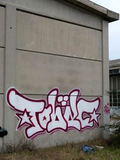 graffiti spray painted on the side of a building