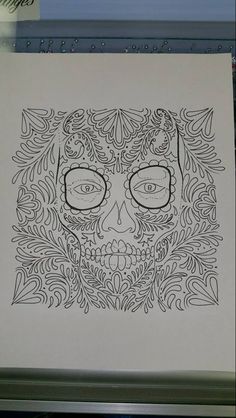 a drawing of a skull with glasses on it's face is shown in black and white