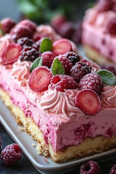 there is a piece of cake with berries on it