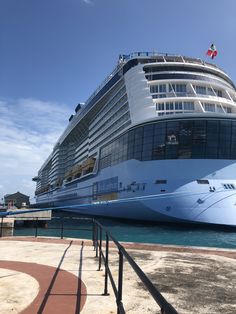 a large cruise ship docked at the dock