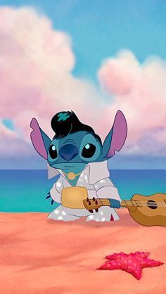 an animated character playing guitar on the beach with a starfish in front of him