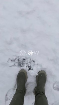 someone is standing in the snow with their feet up and there is no image on it