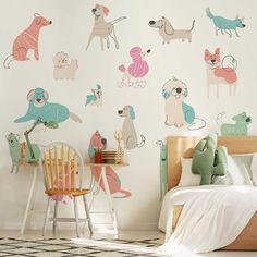 a child's bedroom with wall decals featuring dogs