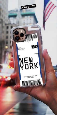 someone is holding up their phone case to show the new york city name and barcode