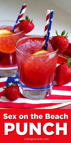 two glasses filled with red, white and blue punch on top of an american flag table cloth