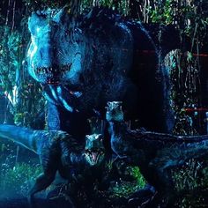 an image of dinosaurs in the jungle with water droplets coming from their mouths and mouth