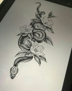 a drawing of a snake with flowers on it