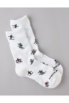 Made from soft cotton/Ribbed cuff/Holiday-inspired pattern Cotton Socks With Ribbed Cuffs, White Casual Socks With Ribbed Cuffs, Casual White Socks With Ribbed Cuffs, Playful White Winter Socks, Winter Cotton Socks With Ribbed Cuffs, Cozy White Cotton Socks, Casual Cotton Socks For Winter, Crew Socks, American Eagle Outfitters