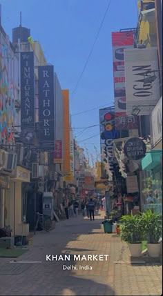 a city street filled with lots of tall buildings