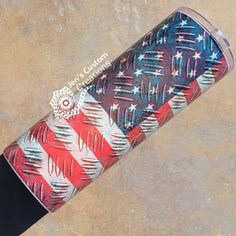 an american flag painted on the side of a skateboard