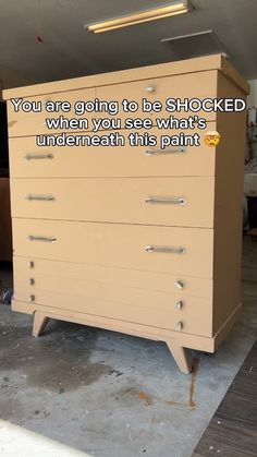 a chest of drawers with the words you are going to be shocked when you see what's underneath this paint