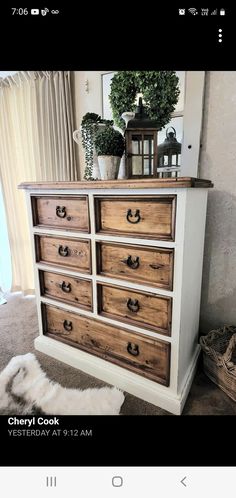 an old dresser has been painted white and brown