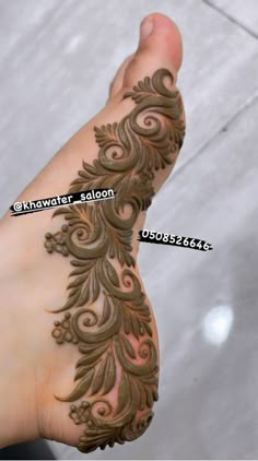 the foot is decorated with intricate designs