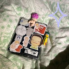 an open suitcase with some stickers on it