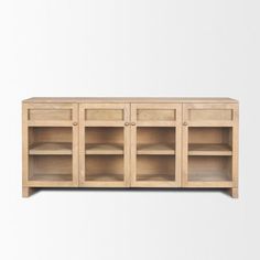 the sideboard is made out of wood and has three open shelves on each side