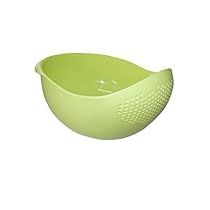 a green colander bowl on a white background