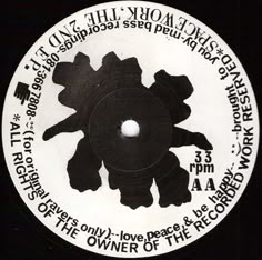 a white and black label with words on the bottom half of it that reads,'the power of the world '