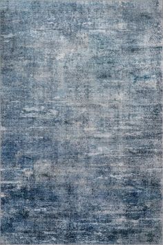 an area rug with blue and gray colors