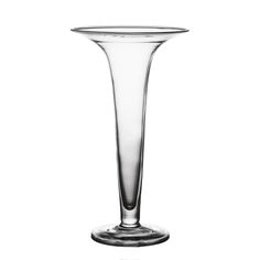 a tall glass vase sitting on top of a table