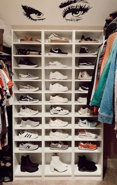 a closet filled with lots of white shoes