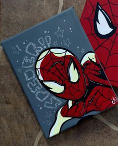 two pieces of art painted to look like spider - man