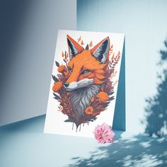 a card with an image of a fox on it and flowers in the foreground