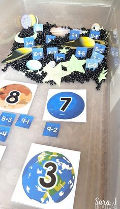 a table topped with lots of different types of numbers and shapes on top of each other