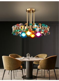 a dining room table with chairs and a chandelier hanging from it's ceiling