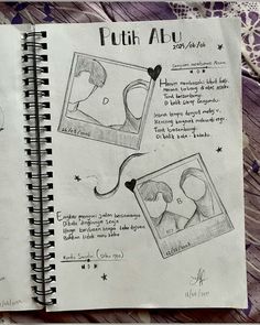 an open notebook with some drawings on it