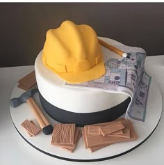 there is a cake that has been made to look like construction equipment on top of it