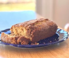 a loaf of bread sitting on top of a blue plate