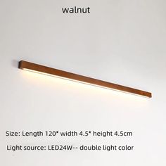 the wall light is made from wood and has dim lighting