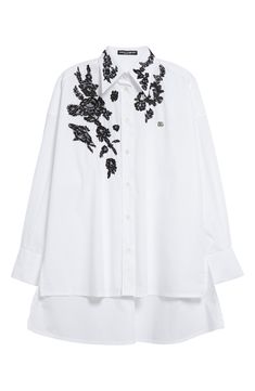 Floral lace appliqués bring bold contrast to a cotton-blend shirt designed with an elongated point collar and a sharply cut high-low hem. Front button closure Point collar Long sleeves with button cuffs Dropped shoulders Side slits High-low hem 98% cotton, 2% polyester Dry clean Made in Italy Designer Clothing High Low Hem, Floral Lace, High & Low, High Low, Button Up Shirts, Designer Clothing, Dolce And Gabbana, Shirt Designs, Button Up