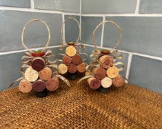 three wine corks are sitting on a table