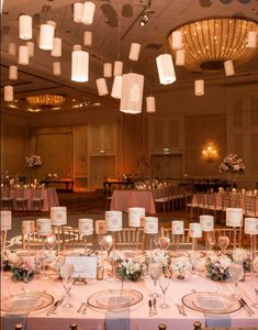 the tables are set for an elegant wedding reception