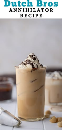 an ice cream sundae in a glass with whipped cream and chocolate topping on top