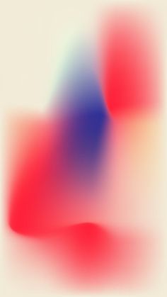 a blurry image of red, white and blue shapes