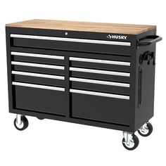 the husky tool cabinet has two drawers and one drawer on casteors for easy storage