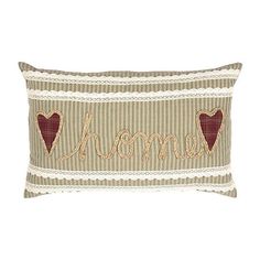 a decorative pillow with the word home on it