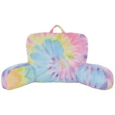 a tie dye bag with two pillows on it