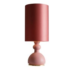 a pink lamp on a white background