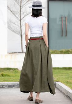 "The skirt is breezy and light; perfect for the summer or spring and I think it just what you are looking for. Detail * 50% Linen, 50% cotton * Front zipper and buttons closure * Two side pockets * Contrast patchwork detail * Asymmetrical maxi construction * Perfect for spring, summer and autumn * Wash by hand or machine with cold water * More color https://www.etsy.com/listing/54987573 SIZE GUIDE Size vary between Brand and Country Please get your body measurement with our Size Guide And Find y Green Linen Skirt, Custom Skirt, Long Linen Skirt, Army Green Skirt, Midi Skirt Casual, Spring Skirt, Skirt Asymmetrical, Simple Casual Outfits, Over 60 Fashion